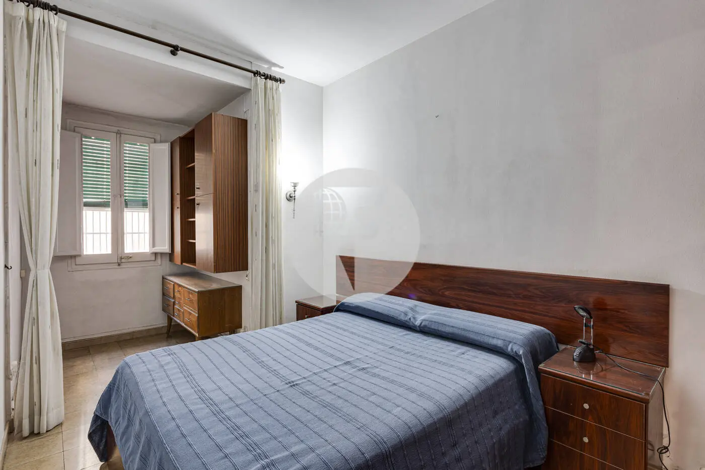 Piso de 3 habitaciones ubicado en el barrio de la Nova Esquerra de l'Eixample de Barcelona. 16