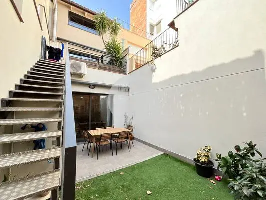 Xalet adossat a Ca n’Aurell, Terrassa