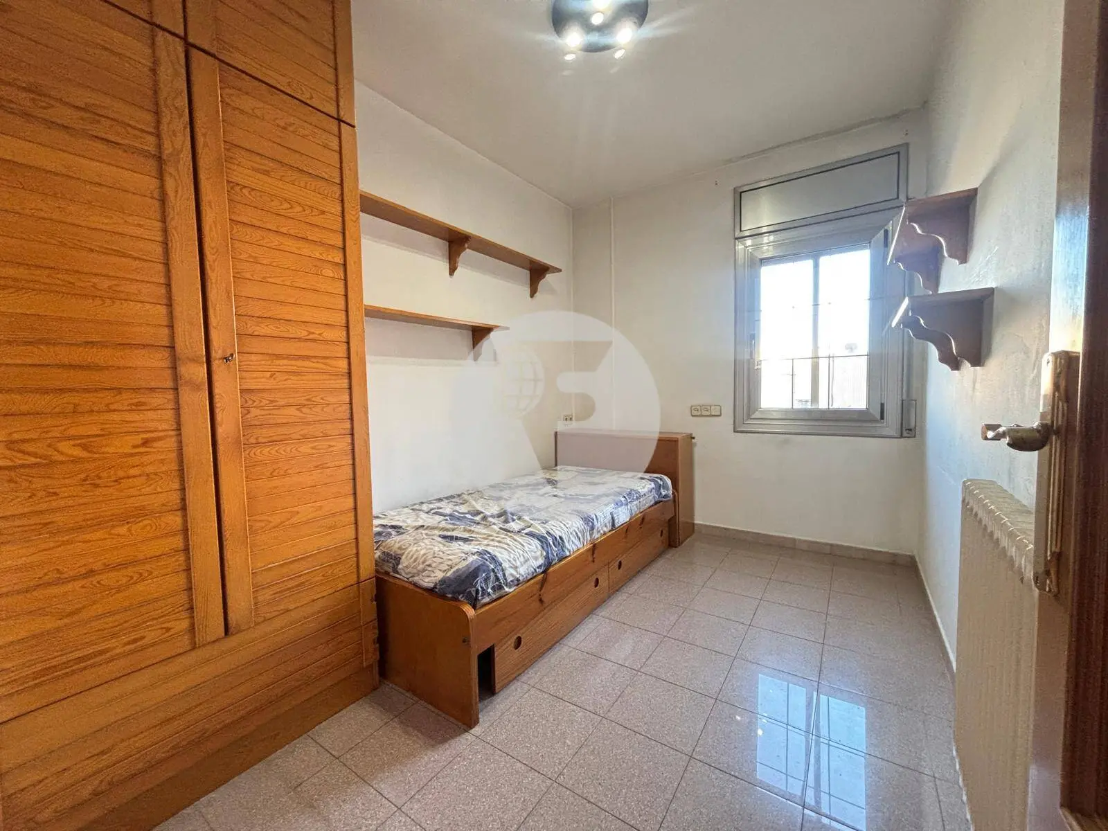 Amplia vivienda de 4 dormitorios con balcón en pleno centro de Granollers - imagen 12